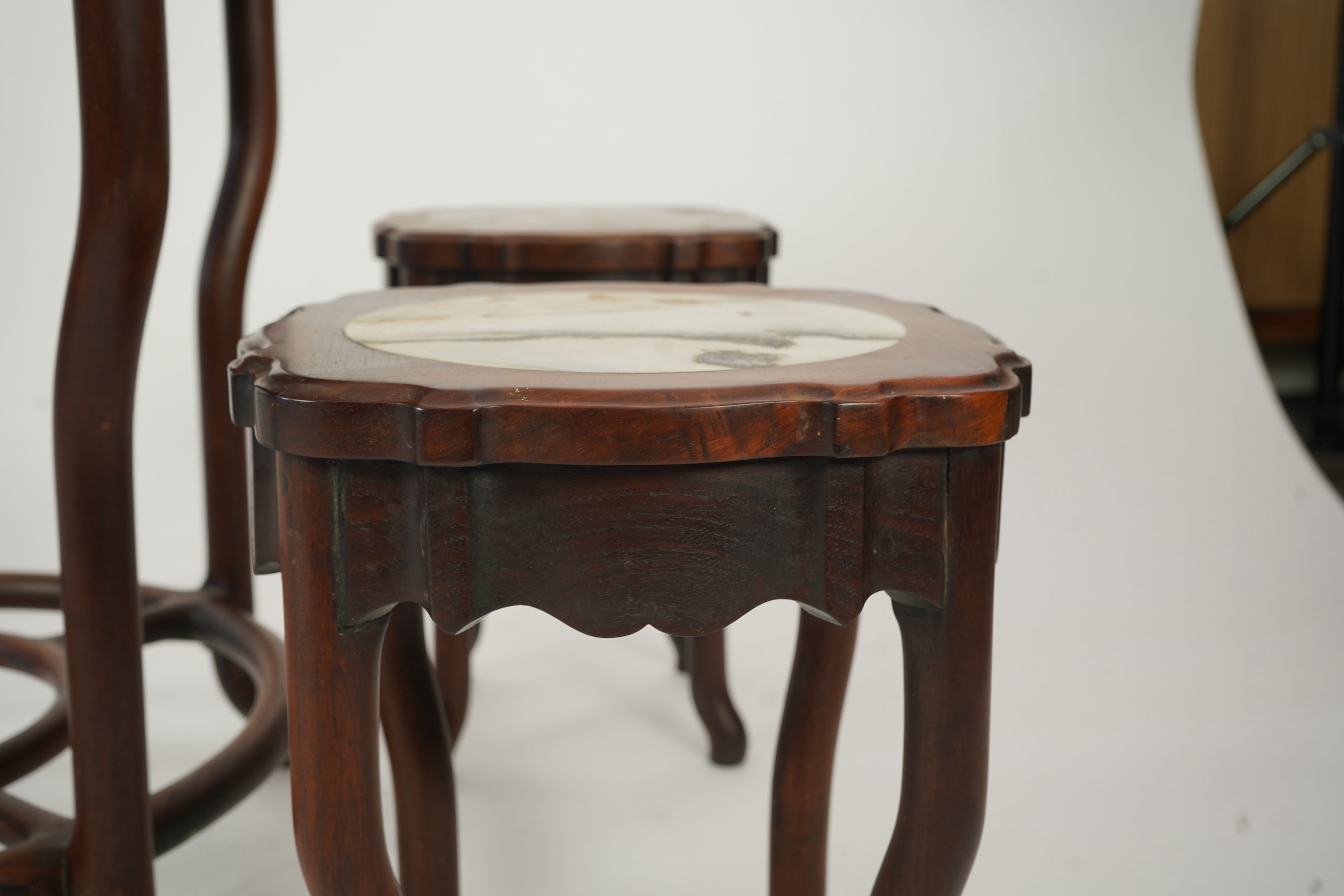 A Chinese dreamstone marble inset hongmu table and four matching stools